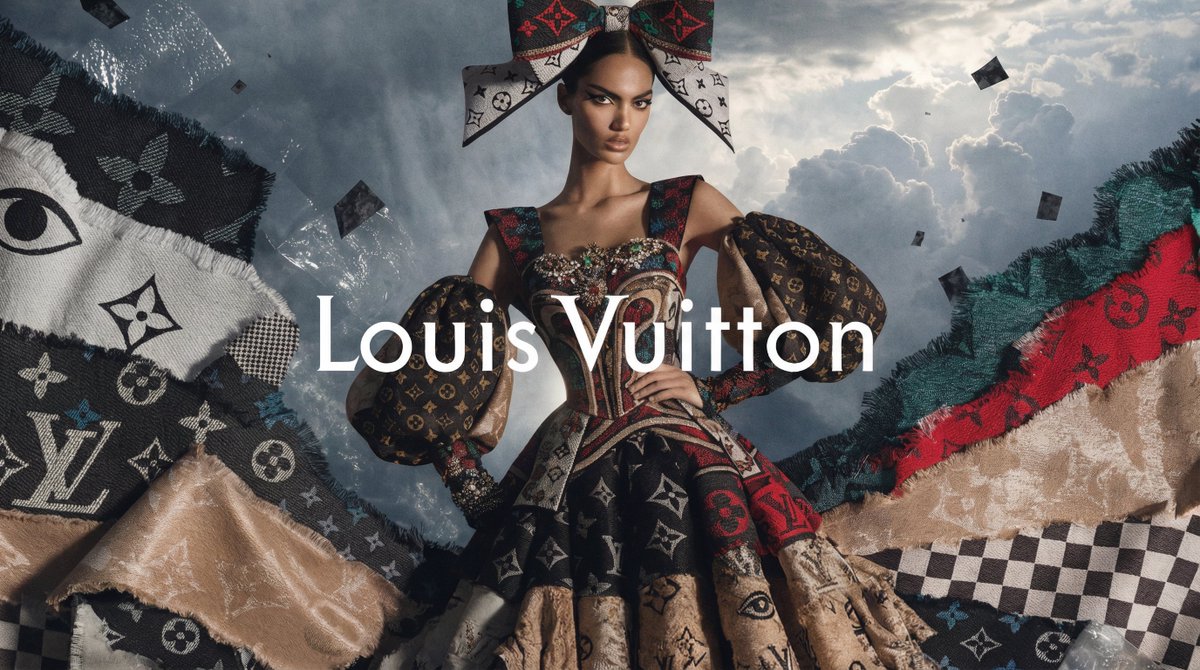 [BRAND]. A high fashion campaign poster. A model with a strong expressive face as the centerpiec 3