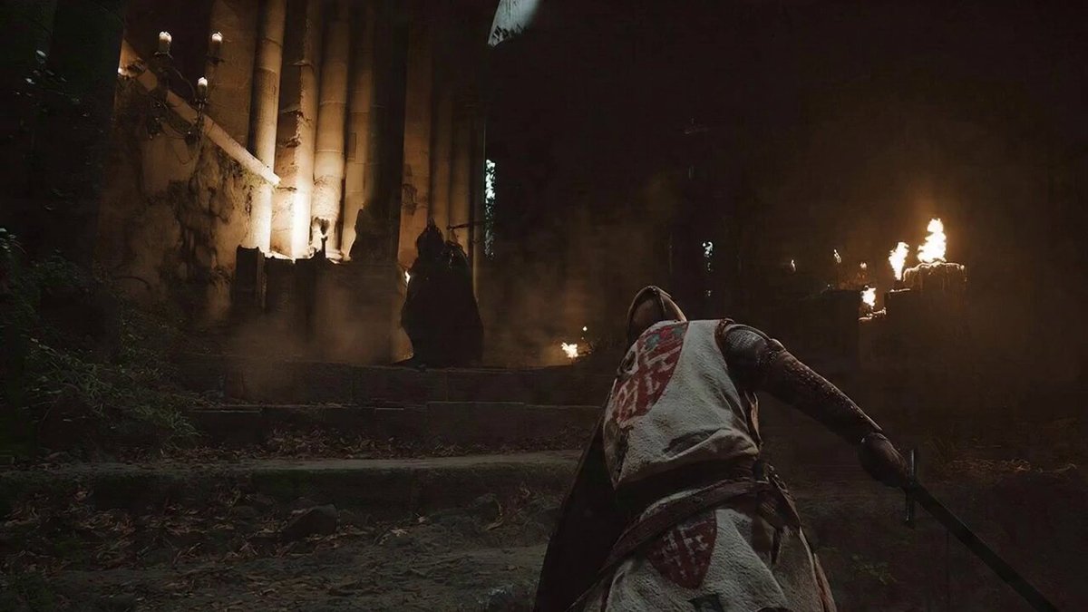 SUBJECTS: A young warrior in worn steel and dark travel cloth fights a towering shadow knight wi