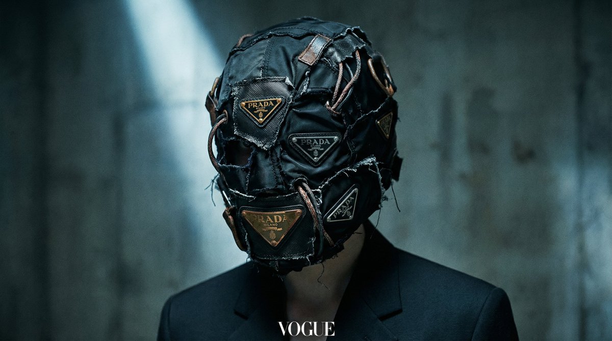 [BRAND]. A hyperrealistic editorial photo of a figure wearing a unique helmet or mask that embod 3