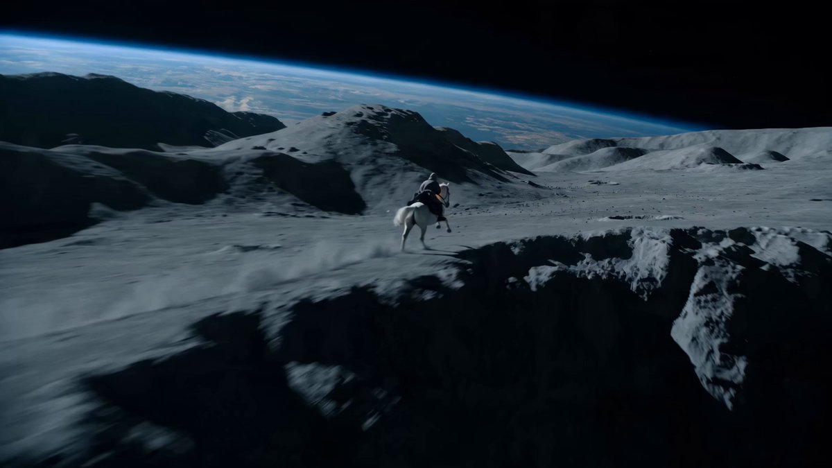 Open on a majestic lunar landscape under black sky, silver dust exploding under the hooves of a 