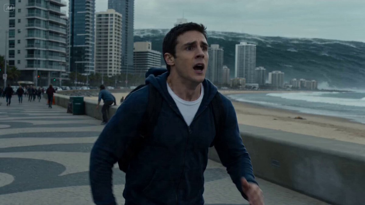 A man sprinting through a coastal city, panic in his eyes, water reflecting in the distance. Tur