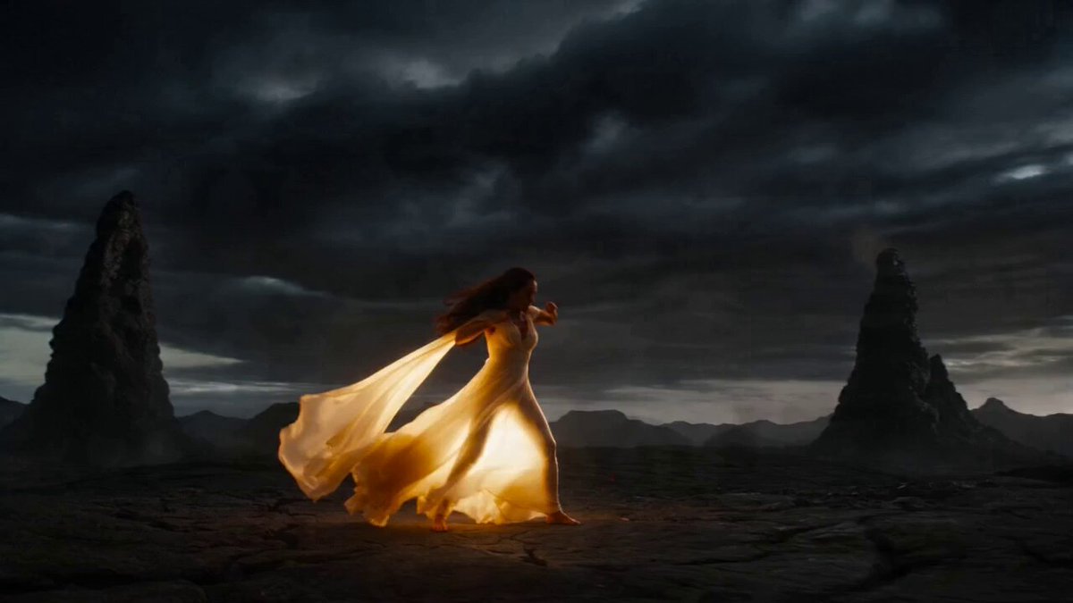 A high-stakes, 15-second cinematic sequence of a sorceress in a pale yellow silk gown performing