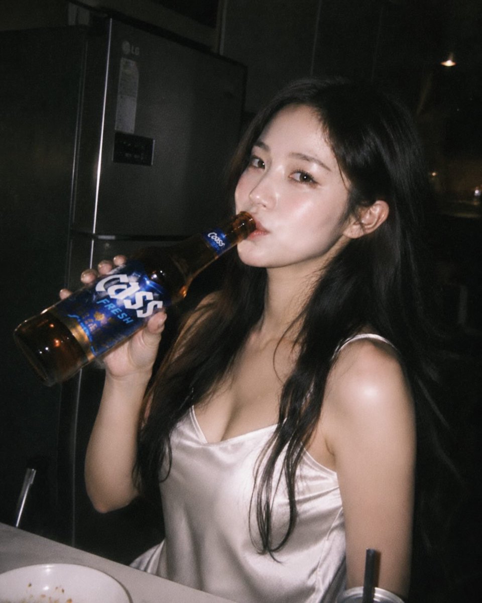 Ultra-realistic candid night photography of a beautiful East Asian woman with long black hair we